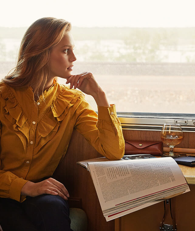 R.M.Williams mustard shirt dreaming in the cabin on The Ghan R.M.Williams mustard shirt dreaming in the cabin on The Ghan